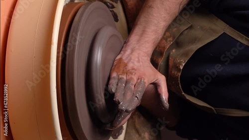 master's transformation of clay into ceramic design with artistic touches
