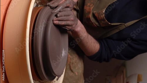 master's transformation of clay into ceramic design with artistic touches