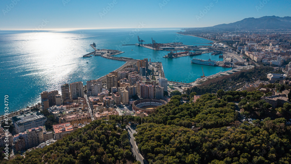 Aerial photo from drone to of Malaga the port, bullfighting arena ,Malaga old town and the new residential areas of Malaga.Spain,Costa del sol, Andalusia (Series)