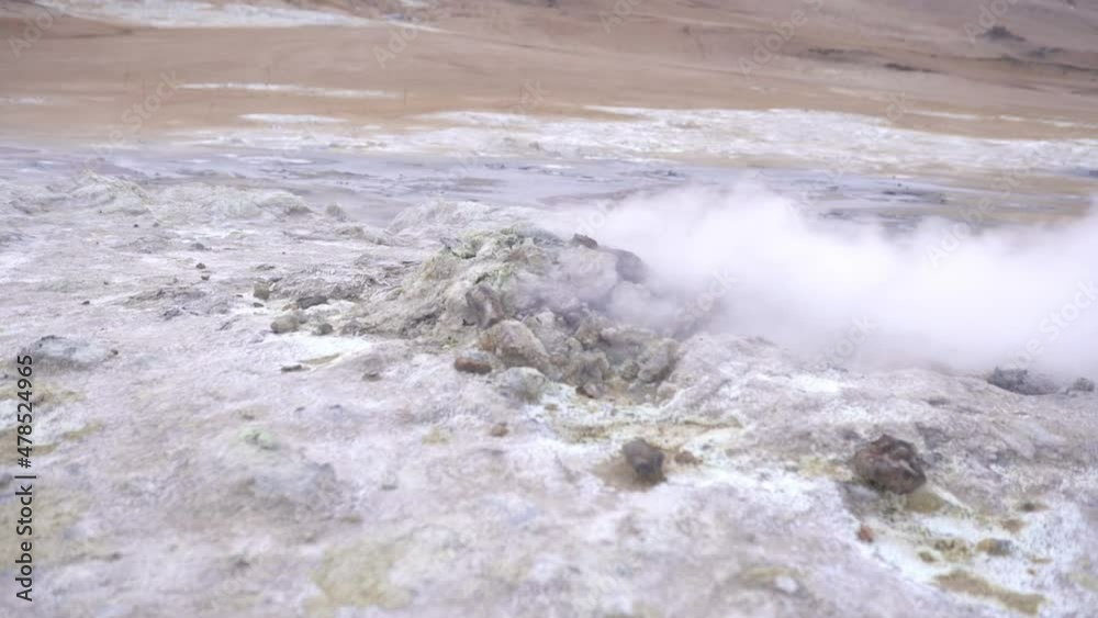 Steaming fumarole in rocky area Steaming fumarole in rocky area