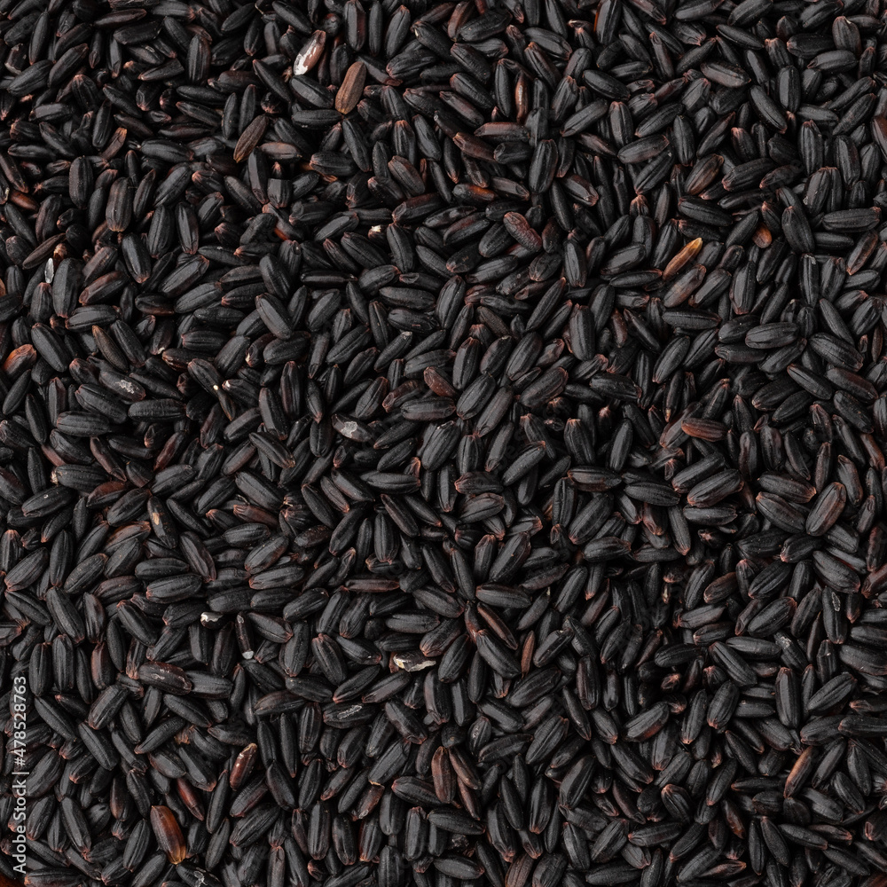 Closeup, top view of raw black rice. Food backdrop Closeup, top view of raw black rice. Food backdrop