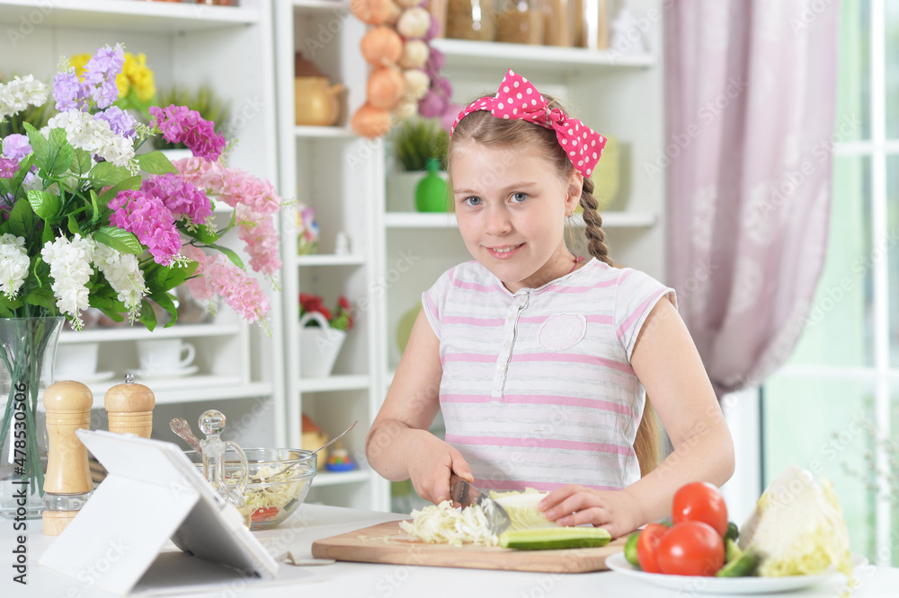 Portrait of cute girl preparing delicious fresh salad Portrait of cute girl preparing delicious fresh salad