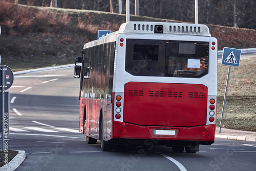 Public transportation bus in urban surroundings.