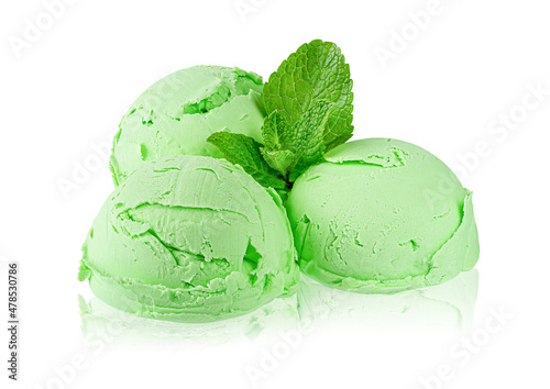 Scoops of green mint ice cream with leaves isolated on white background, clipping path. © Tania