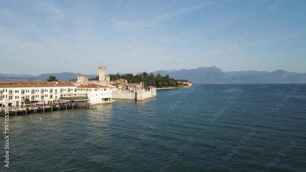 Aerial view of Castello Scaligero (Scaligero Castle), an ancient fortress along Sirmione coastline, Lombardy, italy.