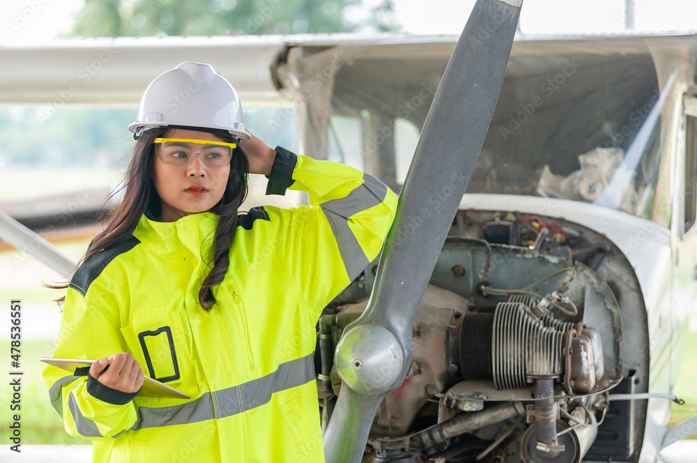 Technician fixing the engine of the airplane,Female aerospace engineering checking aircraft engines,Asian mechanic maintenance inspects plane engine Technician fixing the engine of the airplane,Female aerospace engineering checking aircraft engines,Asian mechanic maintenance inspects plane engine