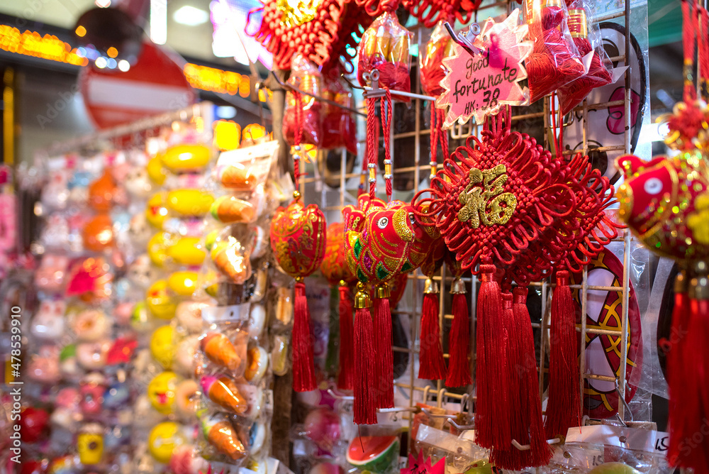 Chinese knot lucky charms for sale at Temple Street Night Market in Hong Kong　香港の男人街（廟街夜市）で売られる中国結びの房飾り