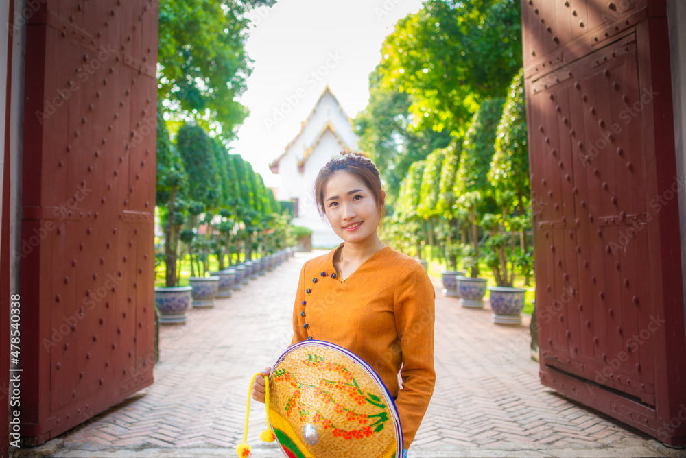 Thai women wearing traditional Thai costumes