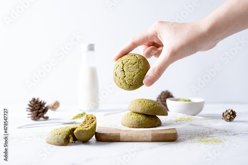 Matcha greentea cookies set on cafe table.
