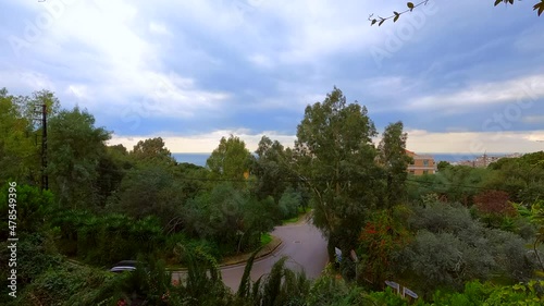 Road timelapse in rainy weather. Cars and trees timelapse