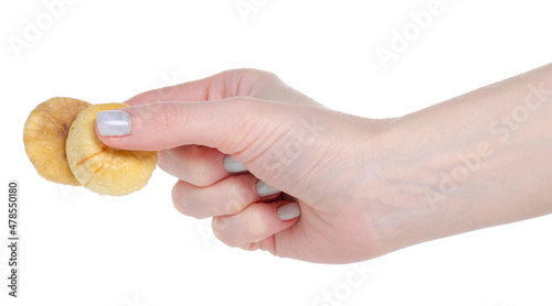 Dried figs in hand on white background isolation