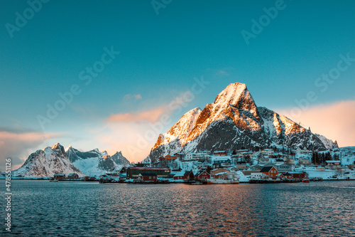 Norway lofoten islands with red houses snow and mountains