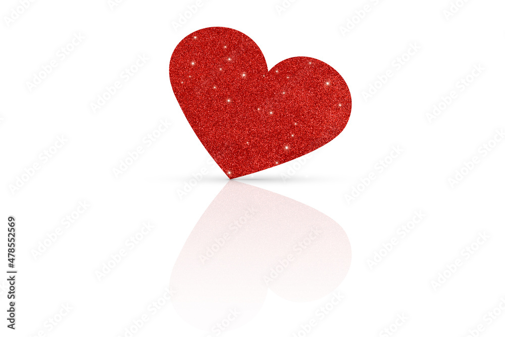 One glittering red heart on a white glossy background. Valentine's Day