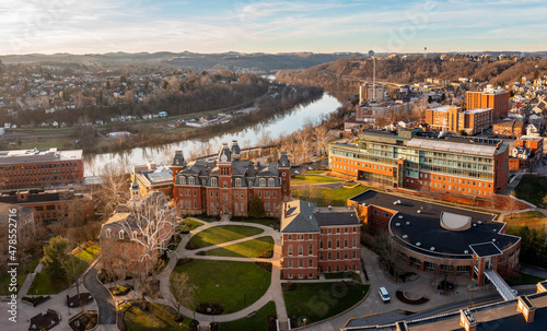 Aerial drone panoramic shot of the downtown campus of WVU in Morgantown West Virginia showing the river in the distance photo