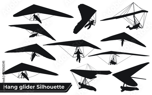 Black Silhouettes Hang Glider or Parachute skydiving