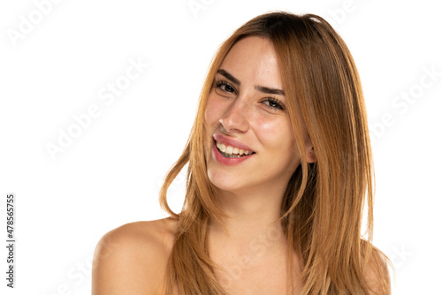 portrait of a young beutiful happy woman with long blond hair