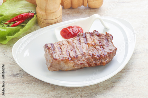 Grilled rib-eye steak beef meat