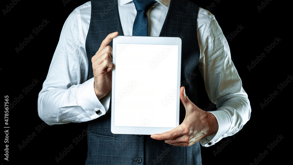 Screen mockup. Empty blank tablet in businessman hand. Mock up screen smart device isolated on black banner background. Game design, mobile application presentation or portfolio mockups. Screen mockup. Empty blank tablet in businessman hand. Mock up screen smart device isolated on black banner background. Game design, mobile application presentation or portfolio mockups.