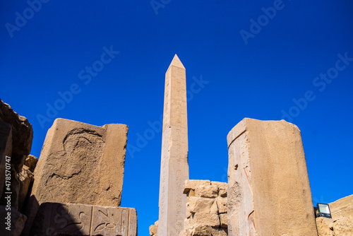  EGYPT - KARNAK TEMPLE - Large sculptures of pharaohs inside beautiful Egyptian landmark with hieroglyphics, and ancient symbols. Famous landmark in the world near Nile River and Luxor, Egypt