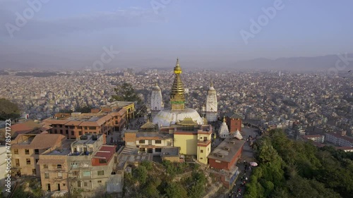 Wallpaper Mural Flying into Swayambhunath Stupa viewing the city of Kathmandu behind. Torontodigital.ca