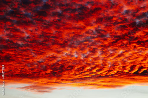 Amazing Dramatic Sunset Sky with Red Clouds © fulya