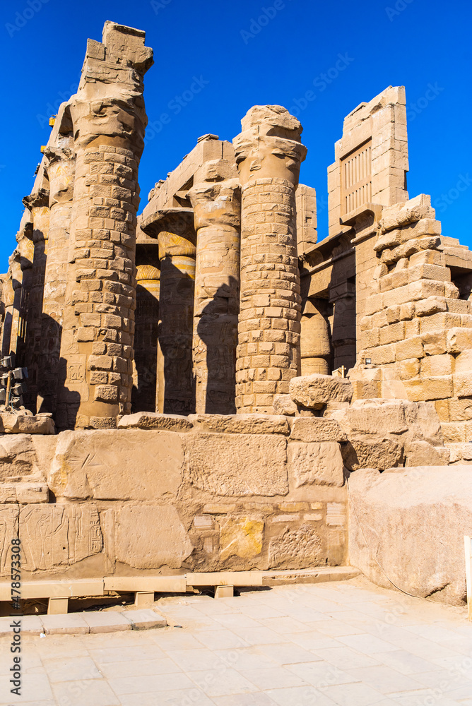 EGYPT - KARNAK TEMPLE - Travel tour group wanders through Karnak Temple. Beautiful Egyptian landmark with hieroglyphics, decayed temples, obelisks, towers, and other buildings. Luxor, Egypt