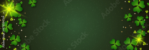 St.Patrick's Day vector banner template. Green background with colorful clover leaves
