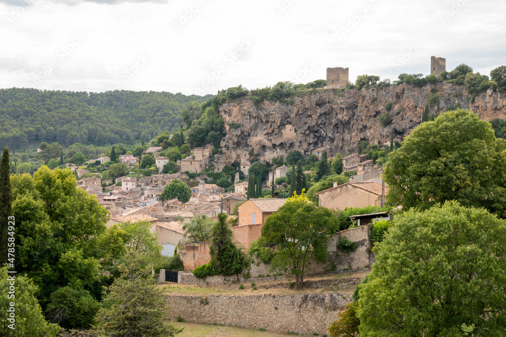 Fototapeta premium Small old village in hear of Provence Cotignac with famous cliffs with cave dwellings