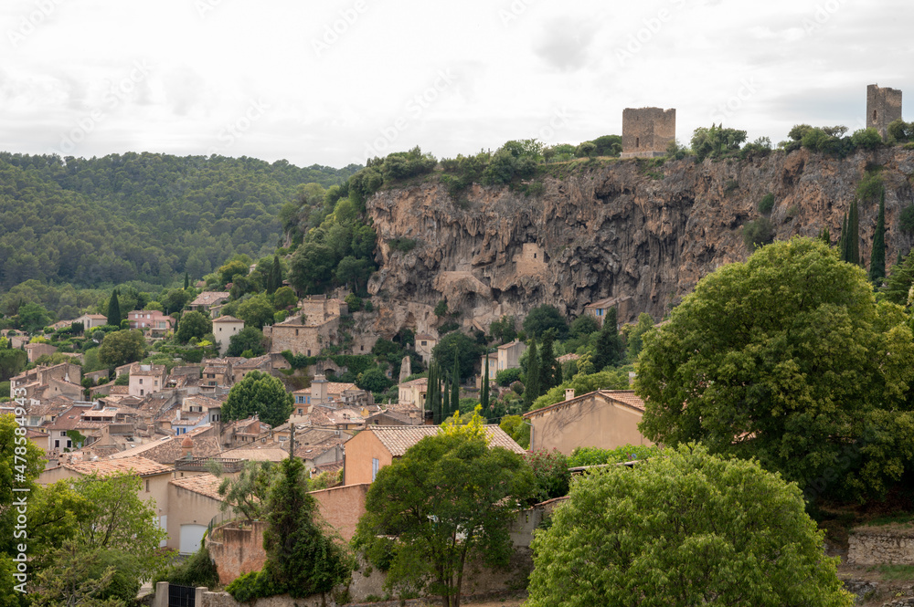 Small old village in hear of Provence Cotignac with famous cliffs with cave dwellings