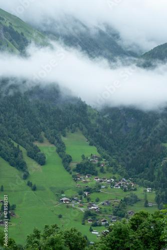 Panoramic view on mountain villages, green forests and apline meadows near Saint-Gervais-les-Bains, Savoy. France © barmalini