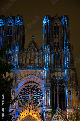 View on gothic Roman Catholic cathedral church Notre-Dame at night in central part of old French city Reims, France