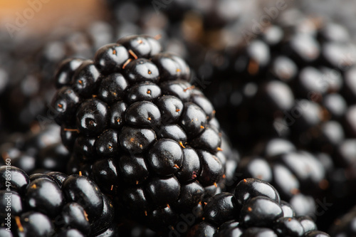 Blackberries background. Closeup ripe blackberries macro shot
