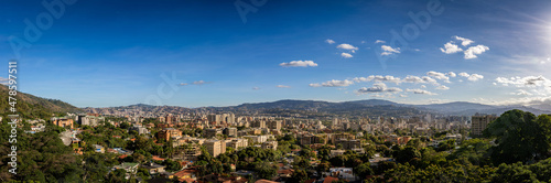 Panoramic view of Caracas City at sunset from Cota Mil. Venezuela