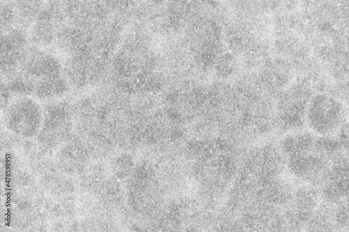 Aged old dark gray rough cement plaster wall with grunge texture for background