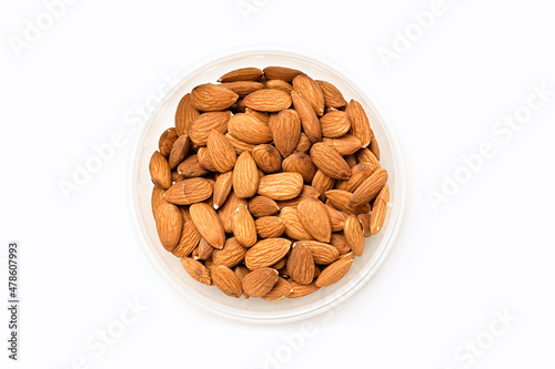 Almond in bowl isolated on white background  