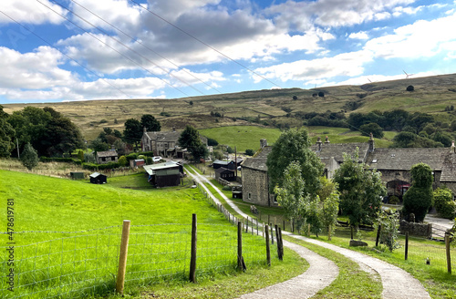 Farms and cottages, high on the moors on a cloudy day near, Oxenhope, Keighley, UK photo