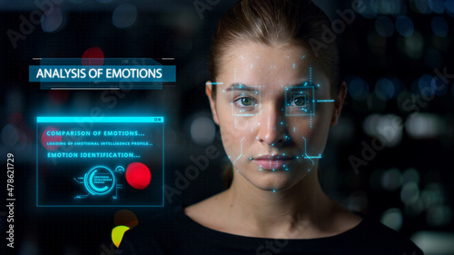 Futuristic biometrical emotions analysis. Closeup woman face biometrics research photo