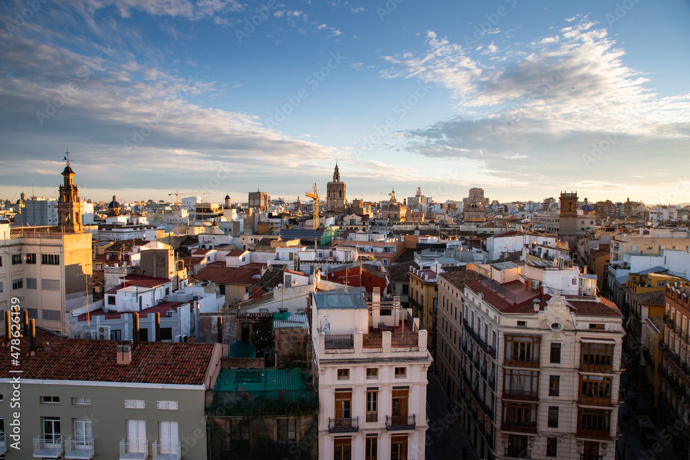 Naklejka premium VALENCIA , SPAIN - DECEMBER 6, 2021: aerial cityscape view from Serranos towers on the old town of Valencia city in Spain