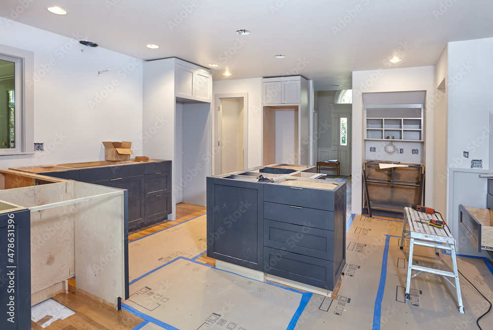 Custom for kitchen island, desk and counters are set in place