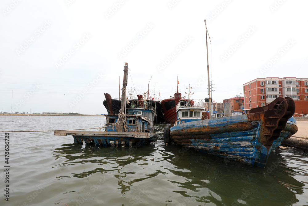 Ships berthing during the summer fishing moratorium are at a fishing port wharf, North China Ships berthing during the summer fishing moratorium are at a fishing port wharf, North China