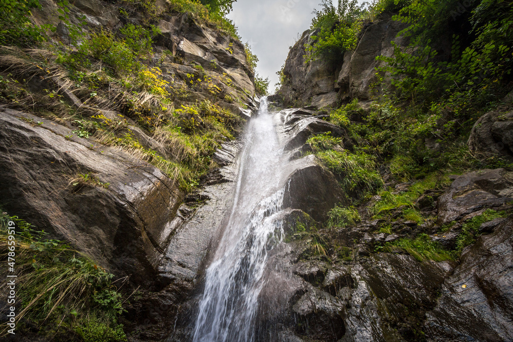 Selective blur on water falling from the Finsterbach wasserfalle waterfalls, in Sattendorf. These are typical mountain alpine waterfalls in the middle of the alps in Carinthia. ....