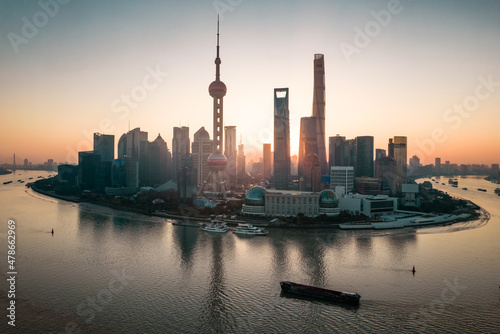 Aerial view of the skyscrapers in Lujiazui  the financial district in Shanghai  China  at sunrise.