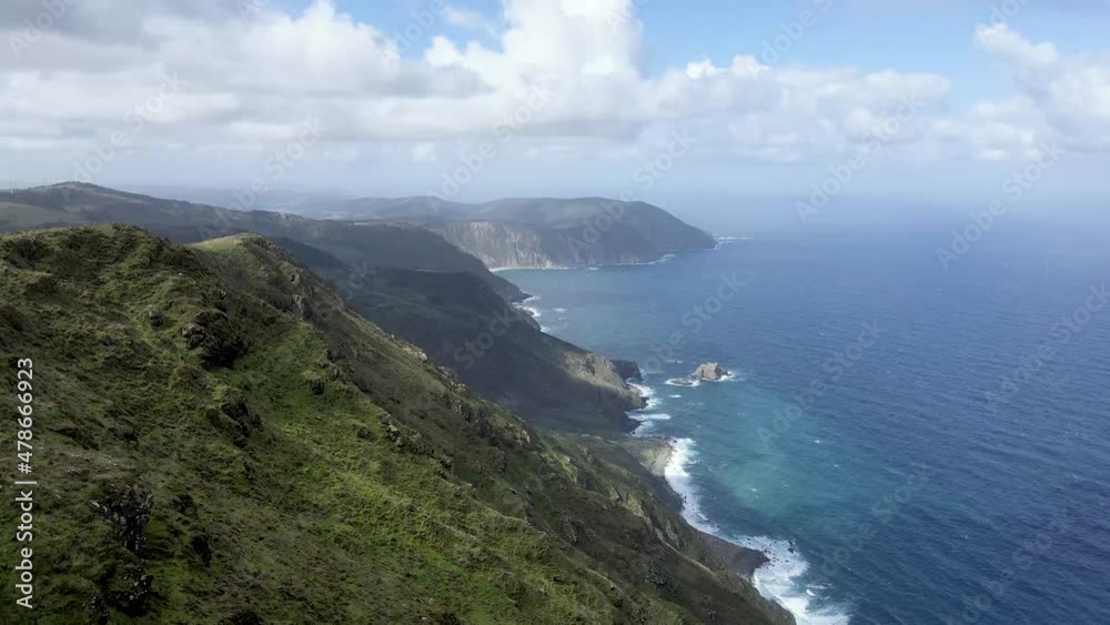 Beautiful aerial drone perspective of the north coast of Galicia. Steep cliffs meets the Atlantic ocean Beautiful aerial drone perspective of the north coast of Galicia. Steep cliffs meets the Atlantic ocean