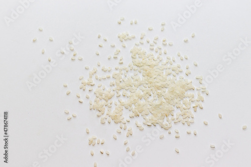 テーブルの上に散らばった白い米粒 photo