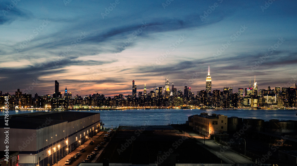 Panorama of the New York City Skyline at sunset on a sunny day
