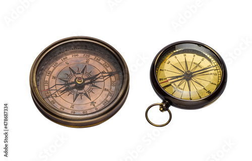 2 old antique compasses isolated on white background