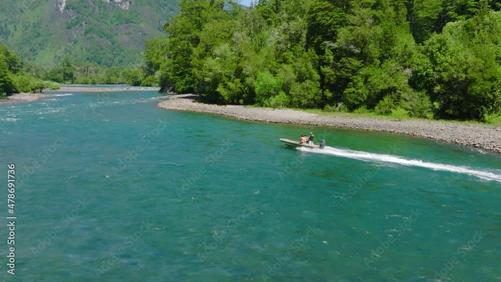 Aerial View Of Speed boat Along Puelo River At Lake District, Chile. Slow Motion Aerial View Of Speed boat Along Puelo River At Lake District, Chile. Slow Motion