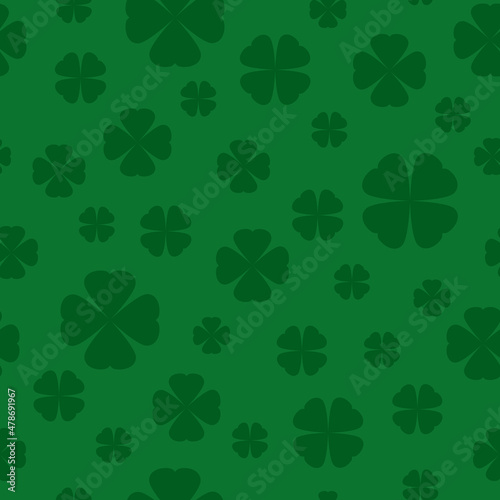 Seamless Shamrock background with dark green blades of grass on green background. St Patrick day vector