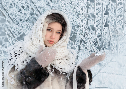 A girl in the winter forest