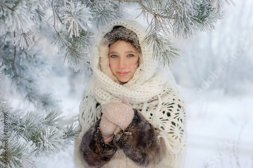 A girl in the winter forest